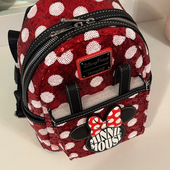 Loungefly Disney Minnie Mouse Sequin Red and White Backpack with Ear Holder - Picture 2 of 4